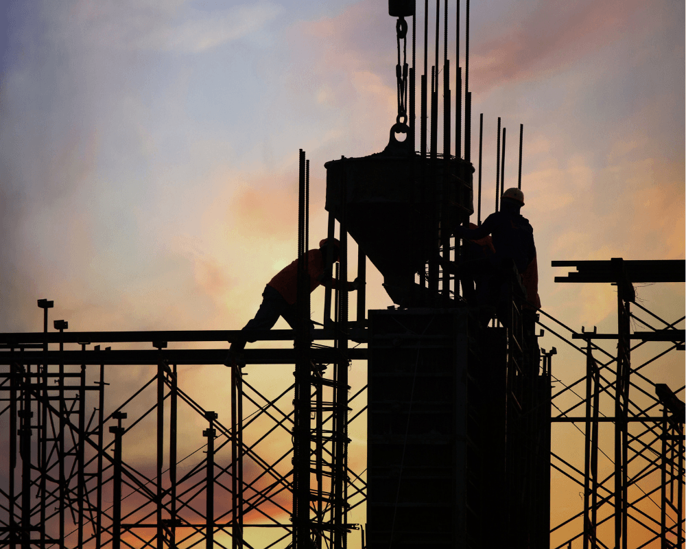 Modern residential building with balconies and greenery